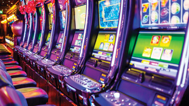 A row of electronic slot machines.