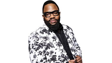 Hezekiah Walker in front of a white background.
