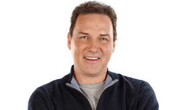 A photo of Norm Macdonald.