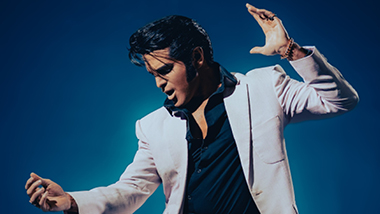 Dean Z: The Ultimate Elvis with blue background