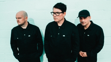 Hawthorne Heights with a blue wall background