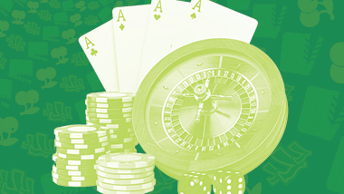 Green filtered roullette table, dice, cards and chips over a green background