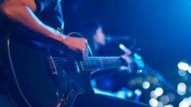 Person playing guitar