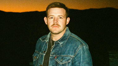 Kameron Marlowe with sunset background